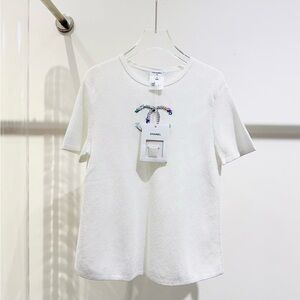 Authentic Chanel White T-Shirt with Embellished Logo